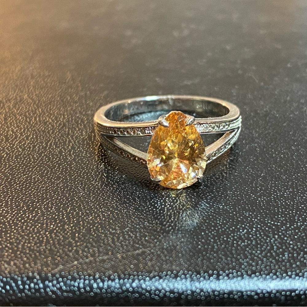 Topaz stone on sterling silver band size 9